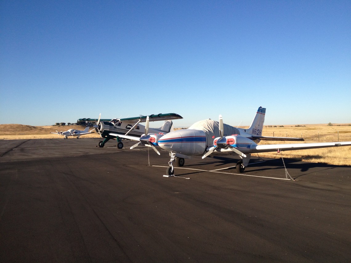 3 airplanes at flying M